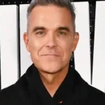 Robbie Williams Net Worth Exposed – UK Pop Icon’s Riches in 2025